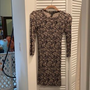 Long-sleeved black and nude flower-print dress